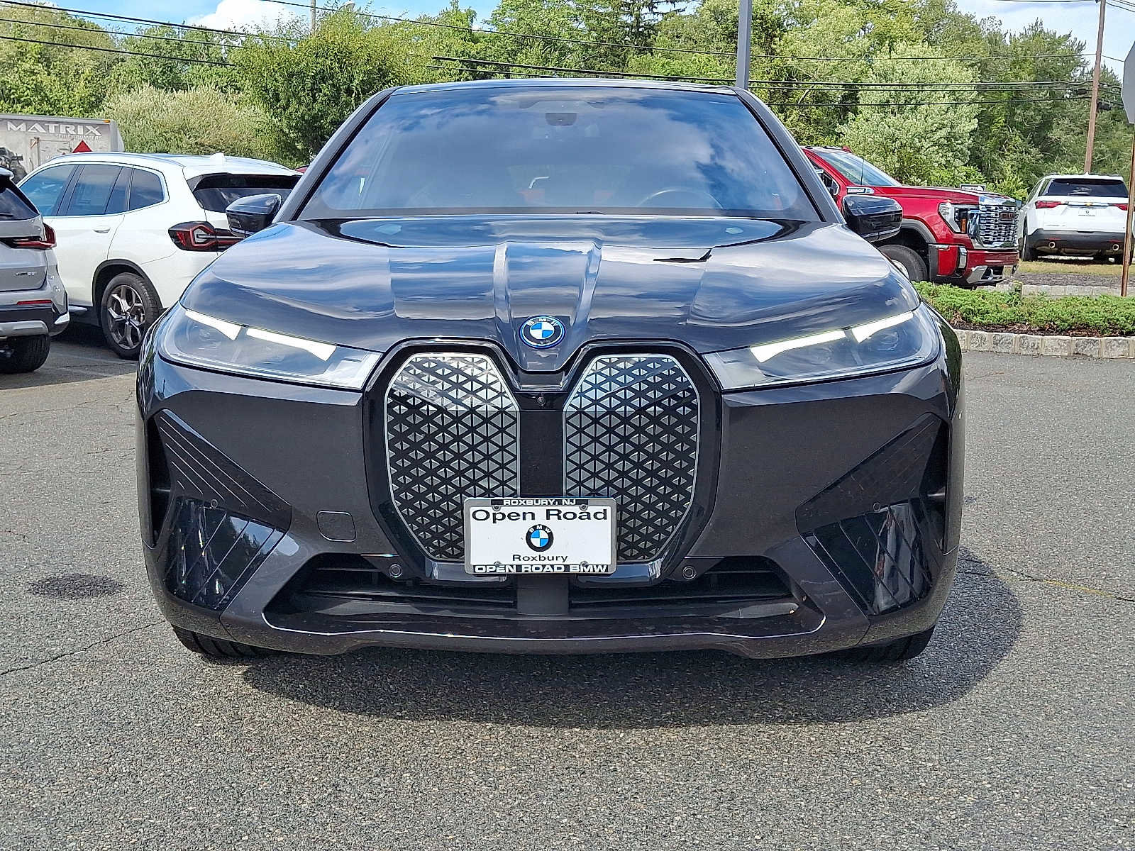 Used 2025 BMW iX xDrive50 w/ Premium Package image 2