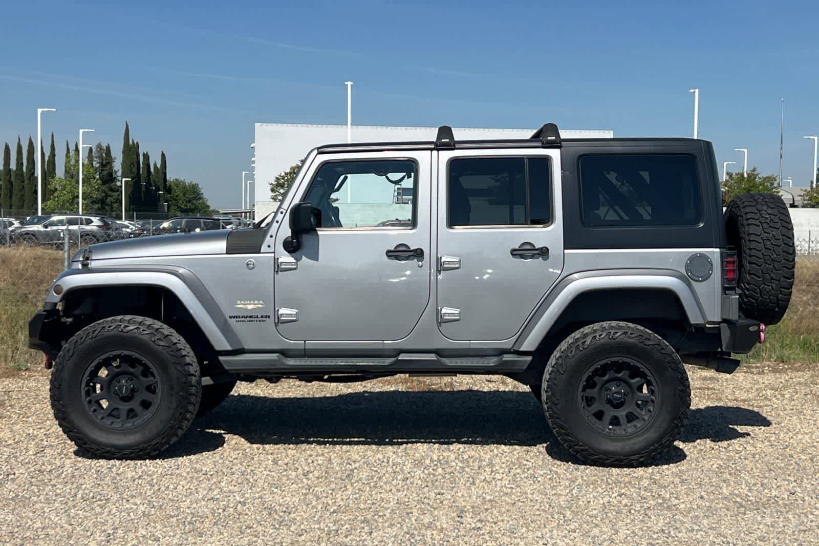 Used 2014 Jeep Wrangler Unlimited Sahara w/ Connectivity Group AWD/4WD image 6