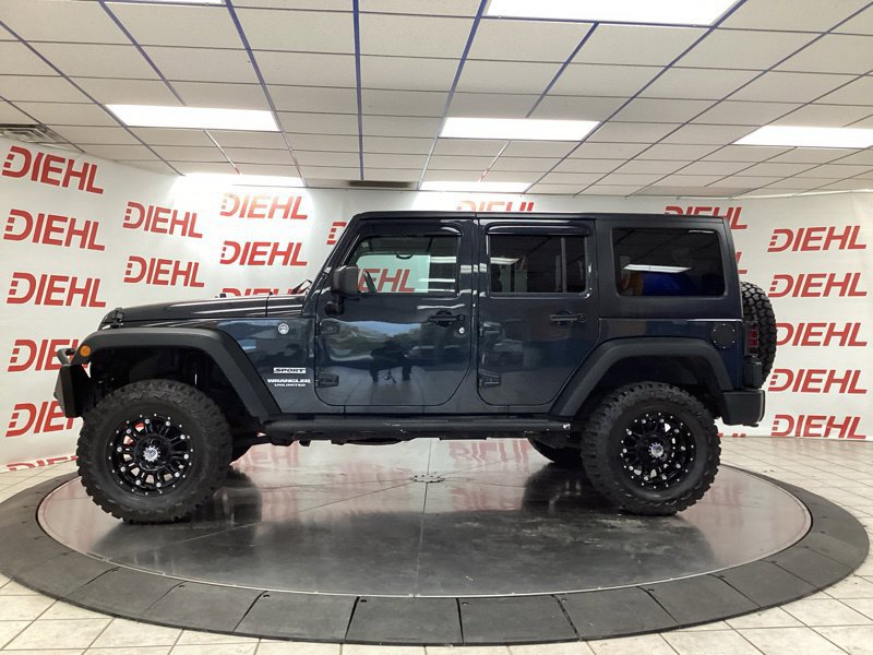 Used 2017 Jeep Wrangler Unlimited Sport w/ Mopar Black Appearance Group AWD/4WD image 4