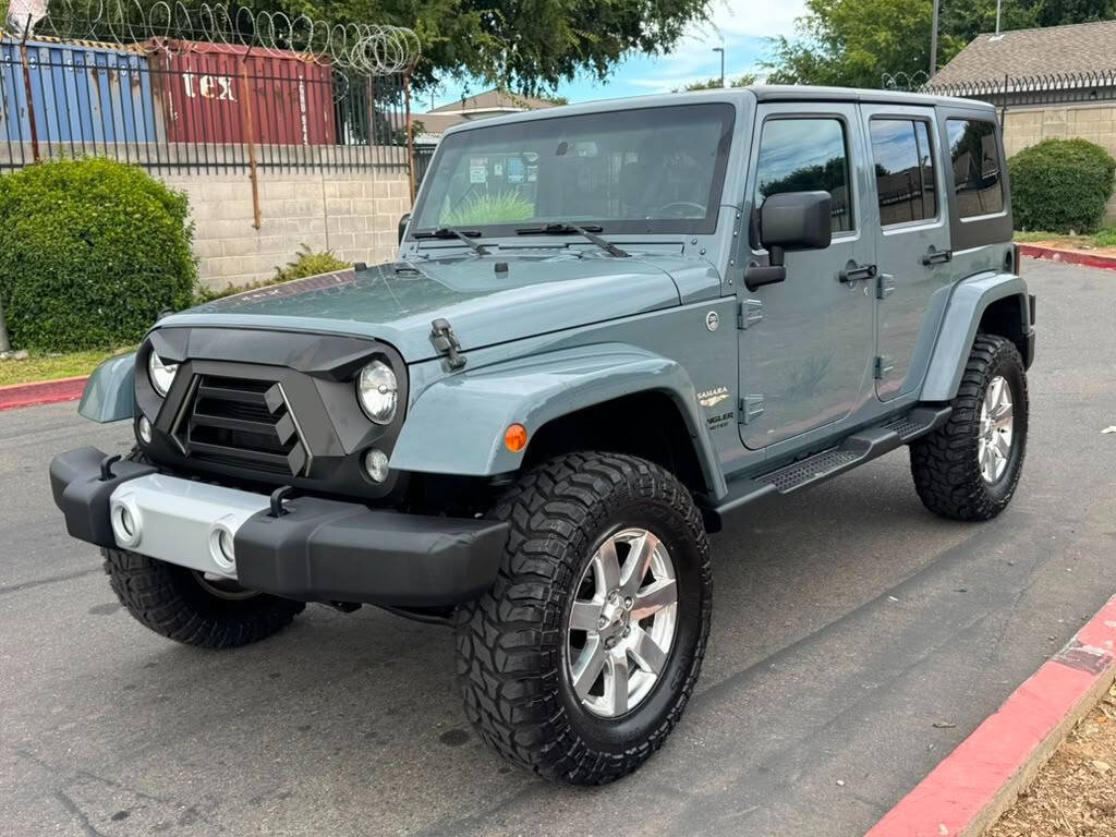 Used 2015 Jeep Wrangler Unlimited Sahara w/ Max Tow Package AWD/4WD image 1