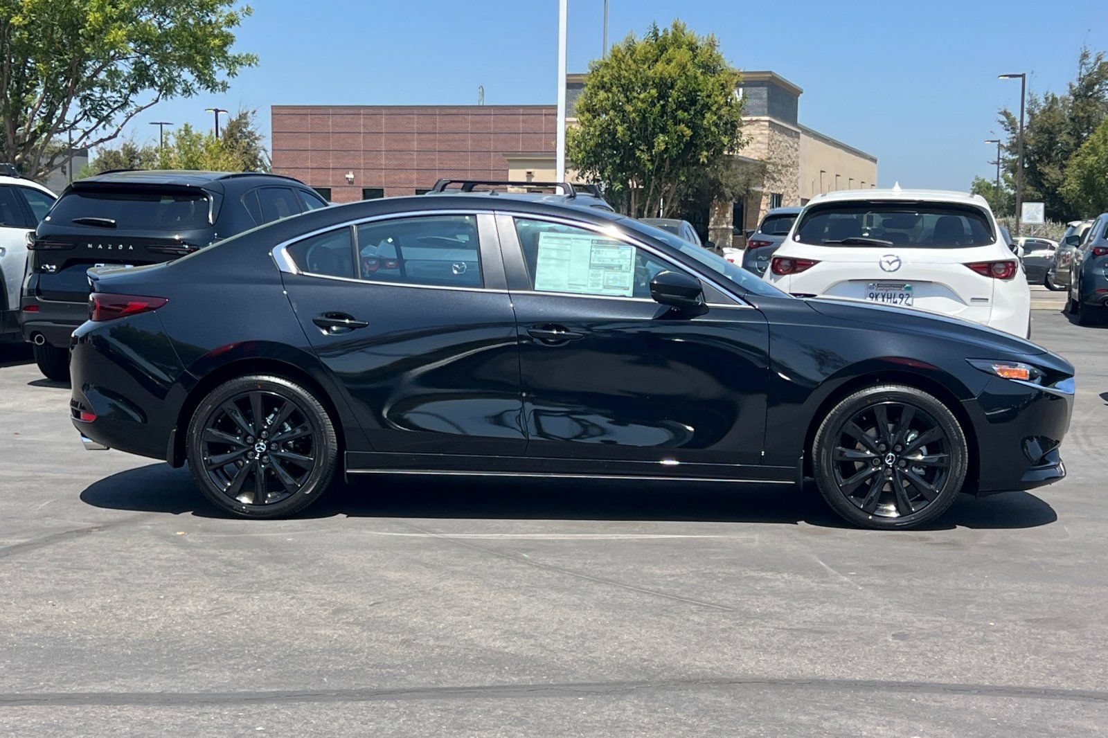 New 2026 MAZDA MAZDA3 Carbon AWD/4WD image 3