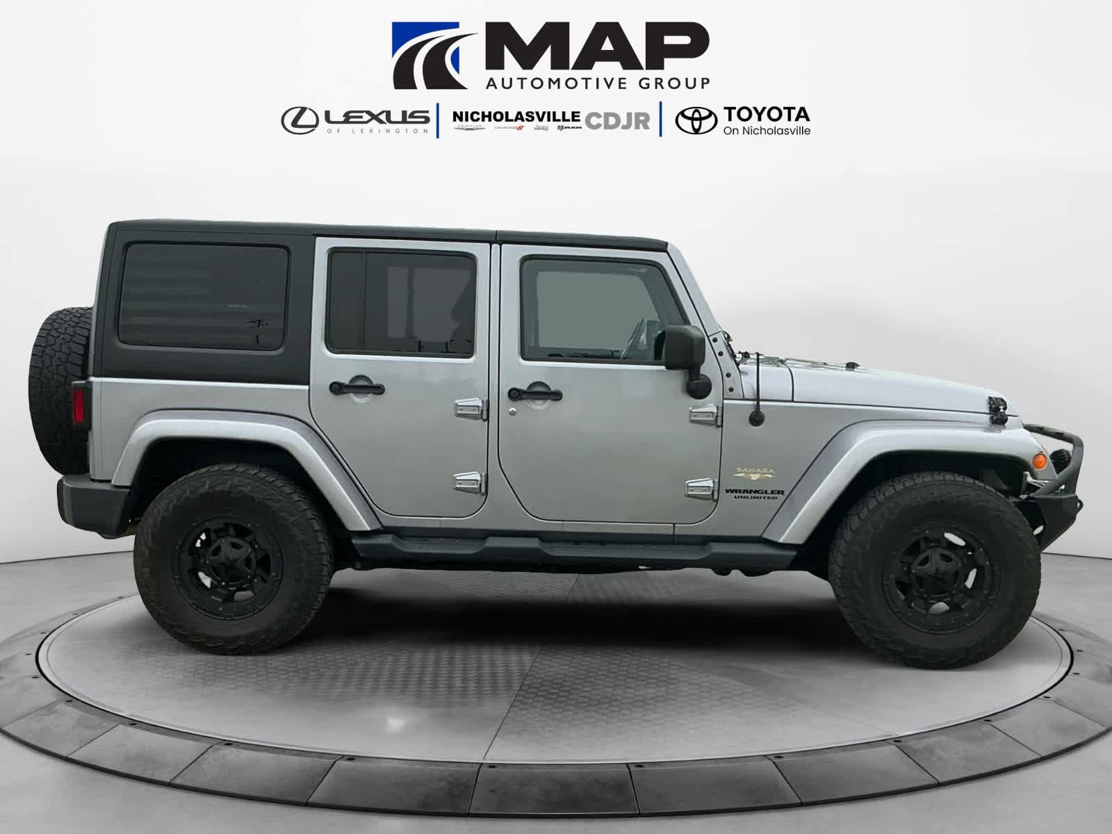 Used 2015 Jeep Wrangler Unlimited Sahara w/ Dual Top Group AWD/4WD image 6