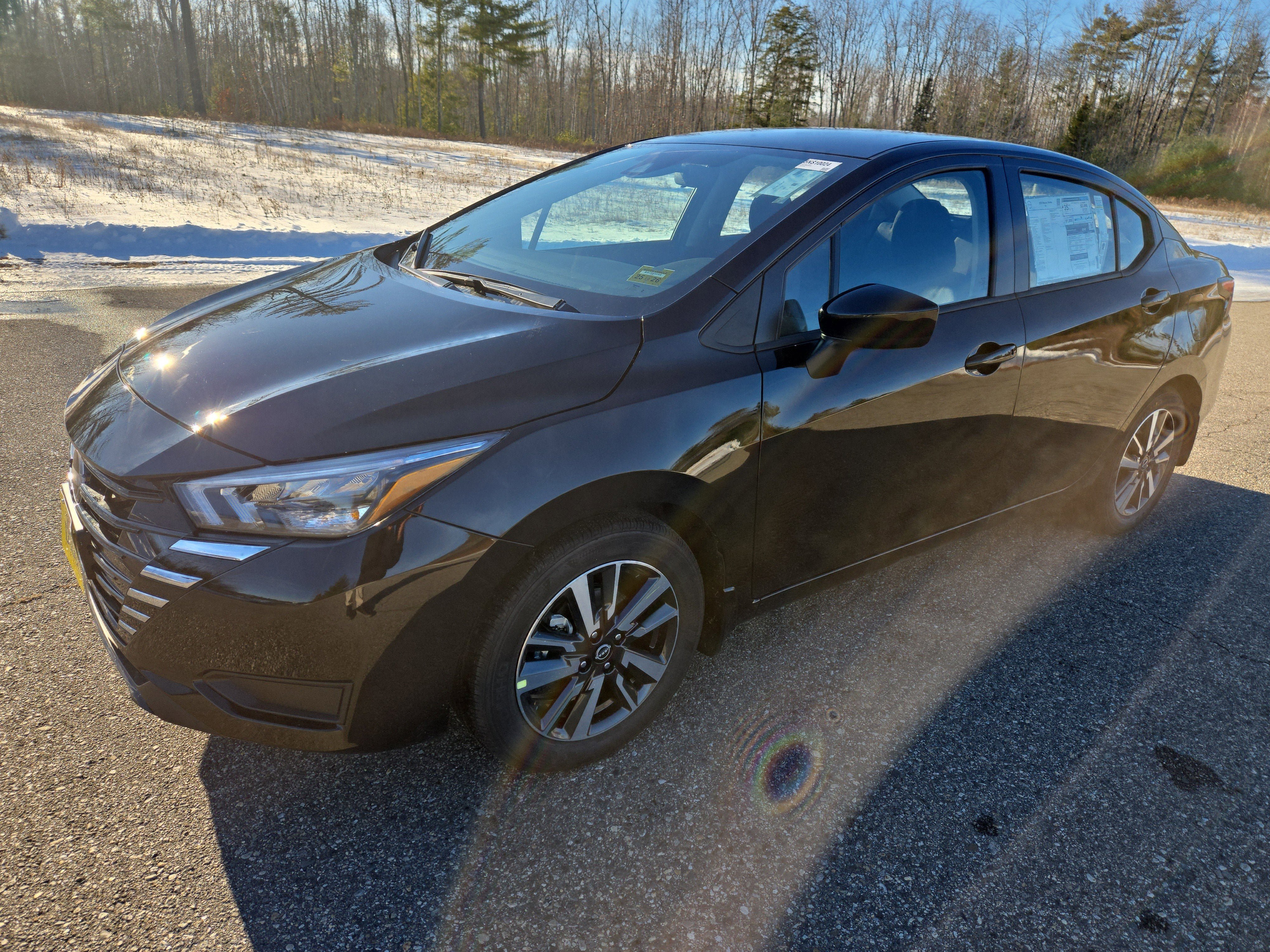 New 2025 Nissan Versa SV w/ Trunk Package FWD image 1