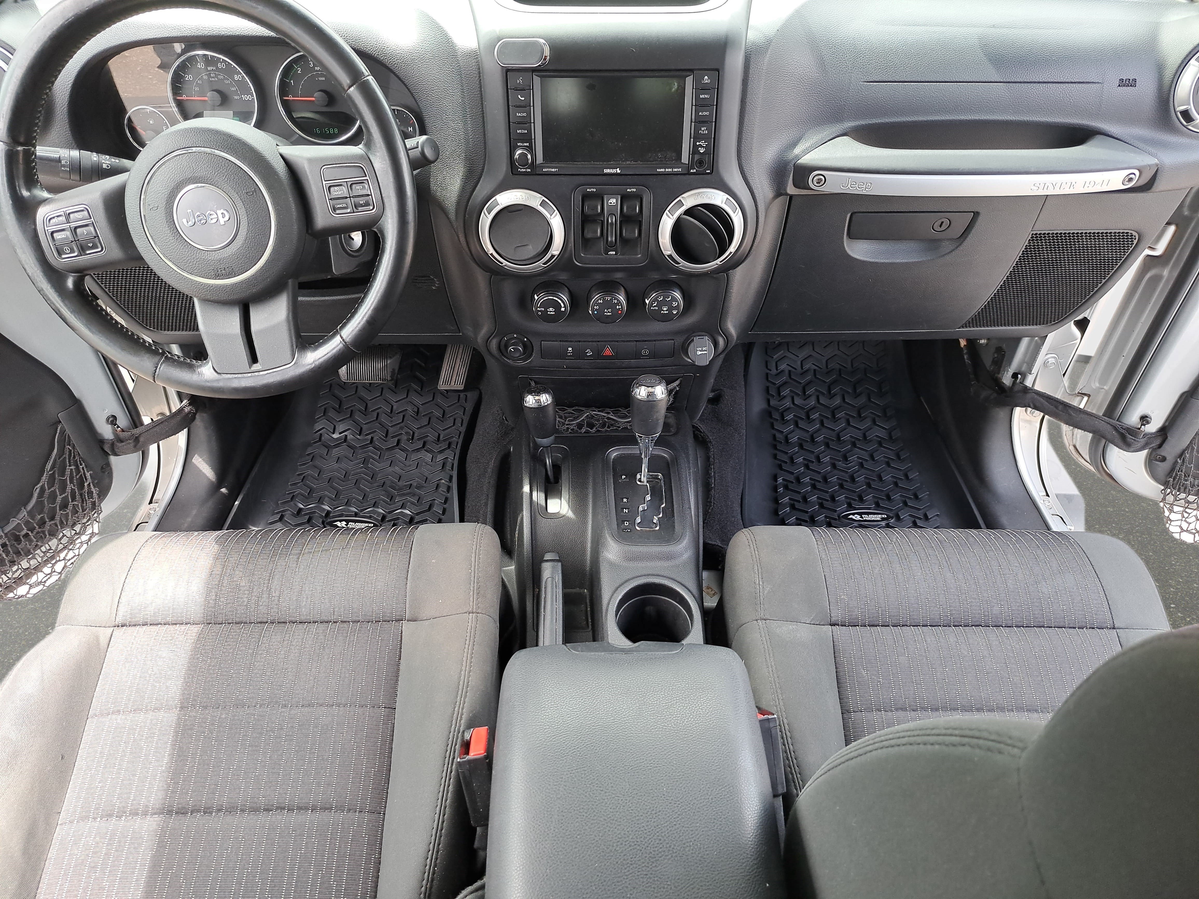 Used 2012 Jeep Wrangler Unlimited Sahara w/ Dual Top Group AWD/4WD image 9