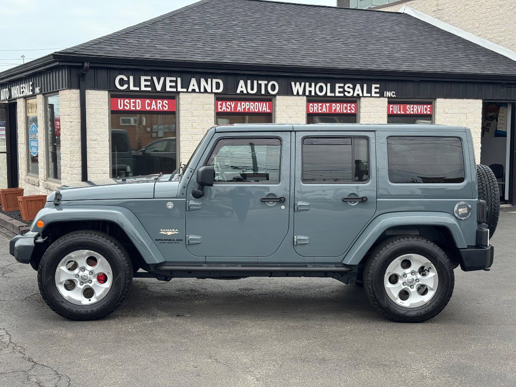 Used 2014 Jeep Wrangler Unlimited Sahara w/ Max Tow Package image 2