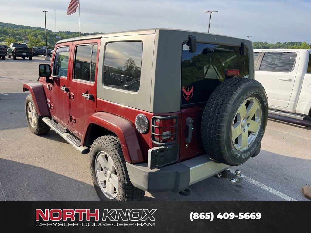 Used 2010 Jeep Wrangler Unlimited Sahara w/ Dual Top Group AWD/4WD image 4
