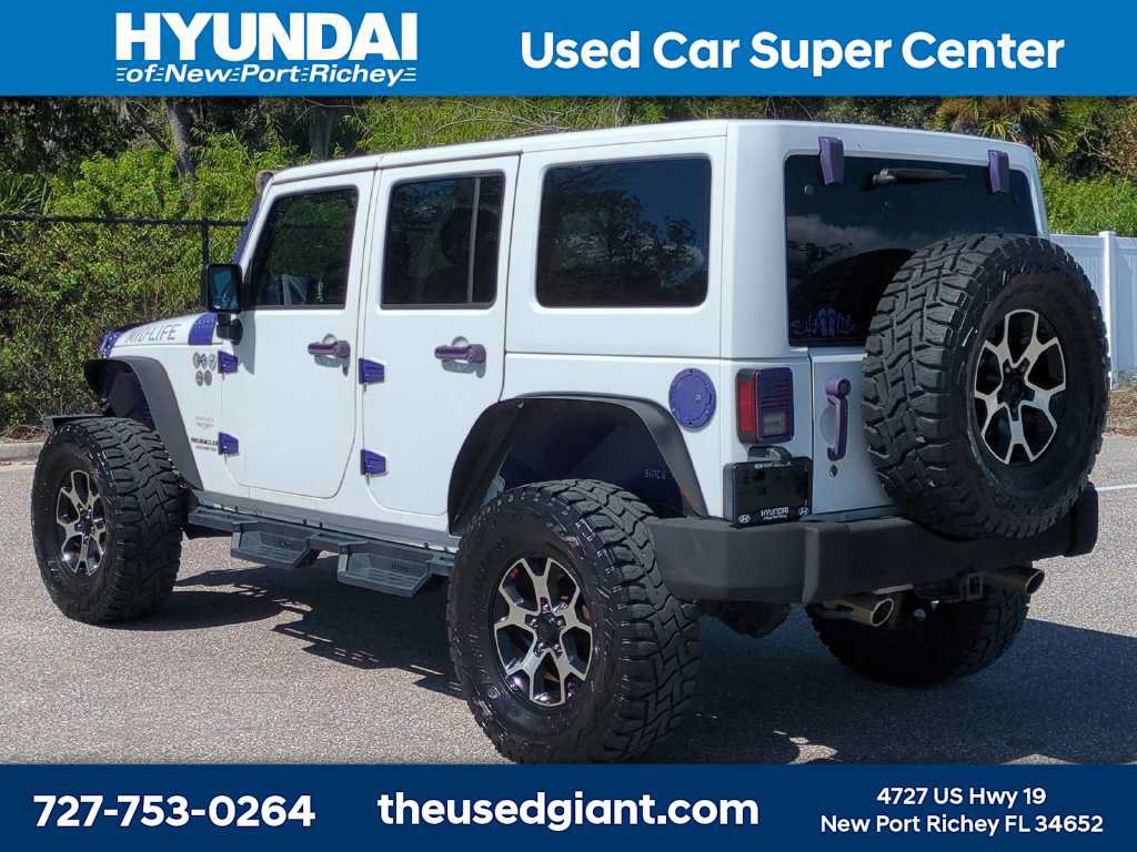 Used 2014 Jeep Wrangler Unlimited Sahara w/ Dual Top Group AWD/4WD image 3