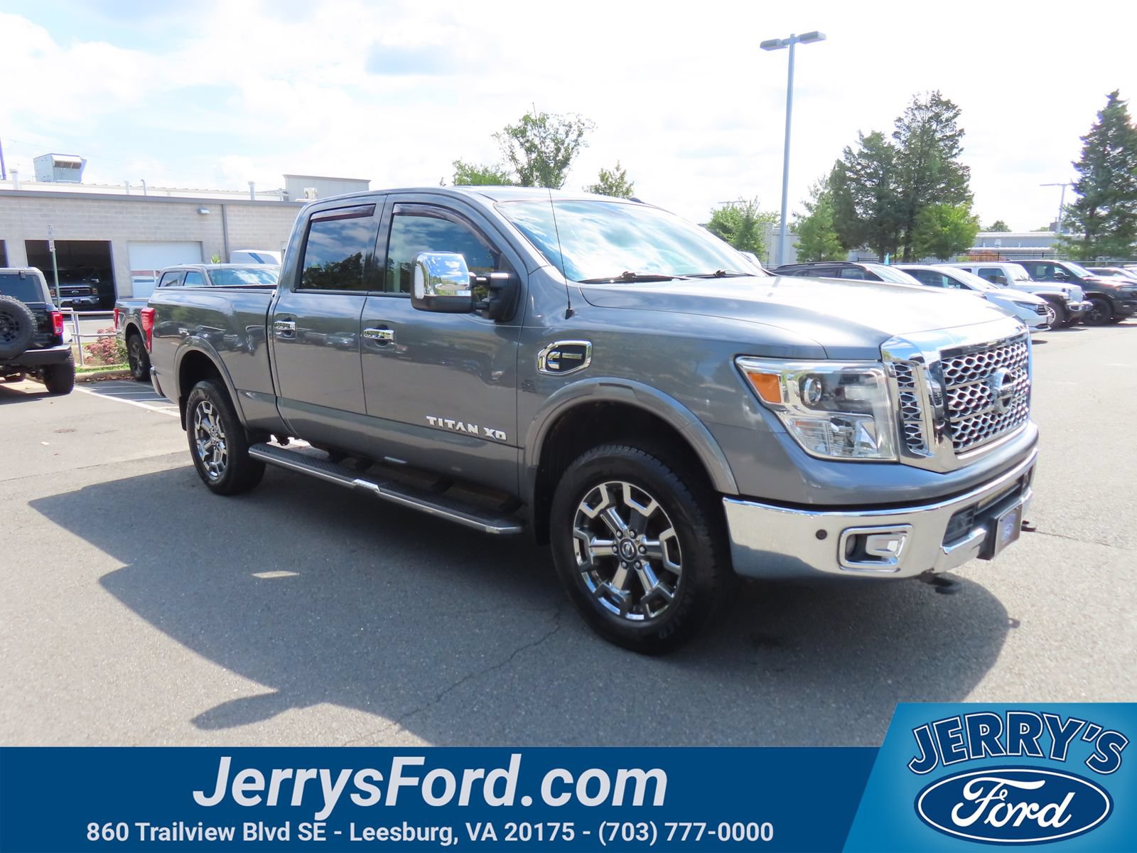 Used 2017 Nissan Titan SL w/ Chrome Package AWD/4WD image 1