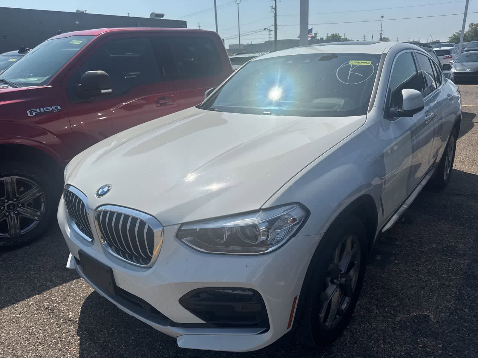 Used 2021 BMW X4 xDrive30i AWD/4WD image 1