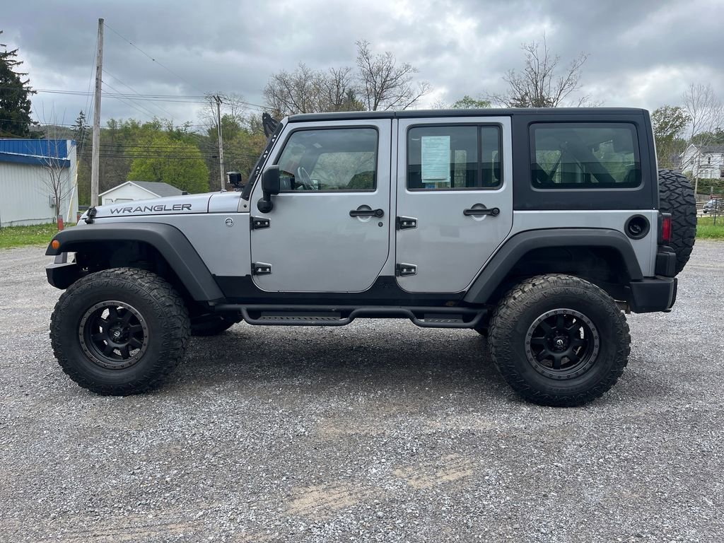 Used 2014 Jeep Wrangler Unlimited Sport w/ Connectivity Group AWD/4WD image 8