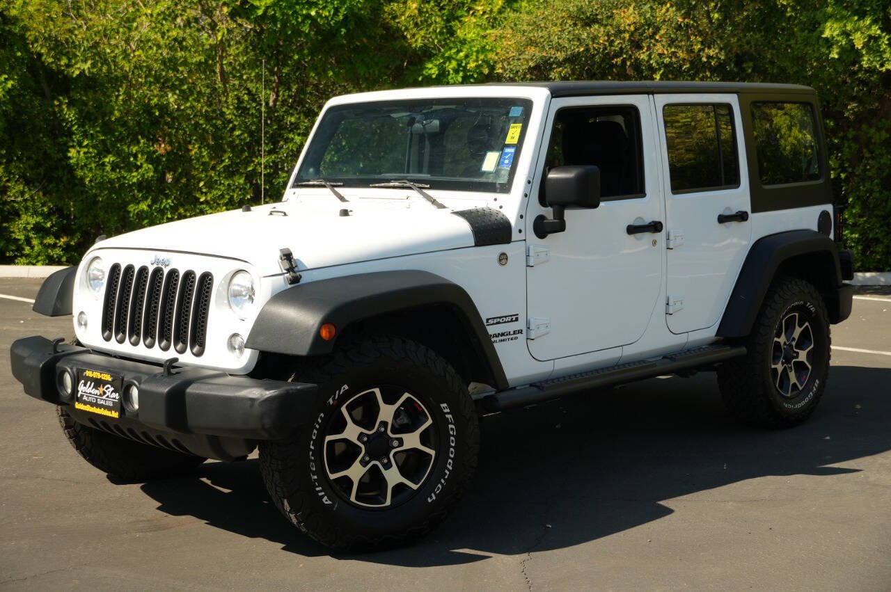 Used 2014 Jeep Wrangler Unlimited Sport w/ Mopar Black Appearance Group AWD/4WD image 2