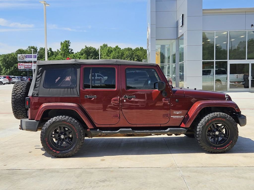 Used 2010 Jeep Wrangler Unlimited Sahara w/ Dual Top Group AWD/4WD image 9