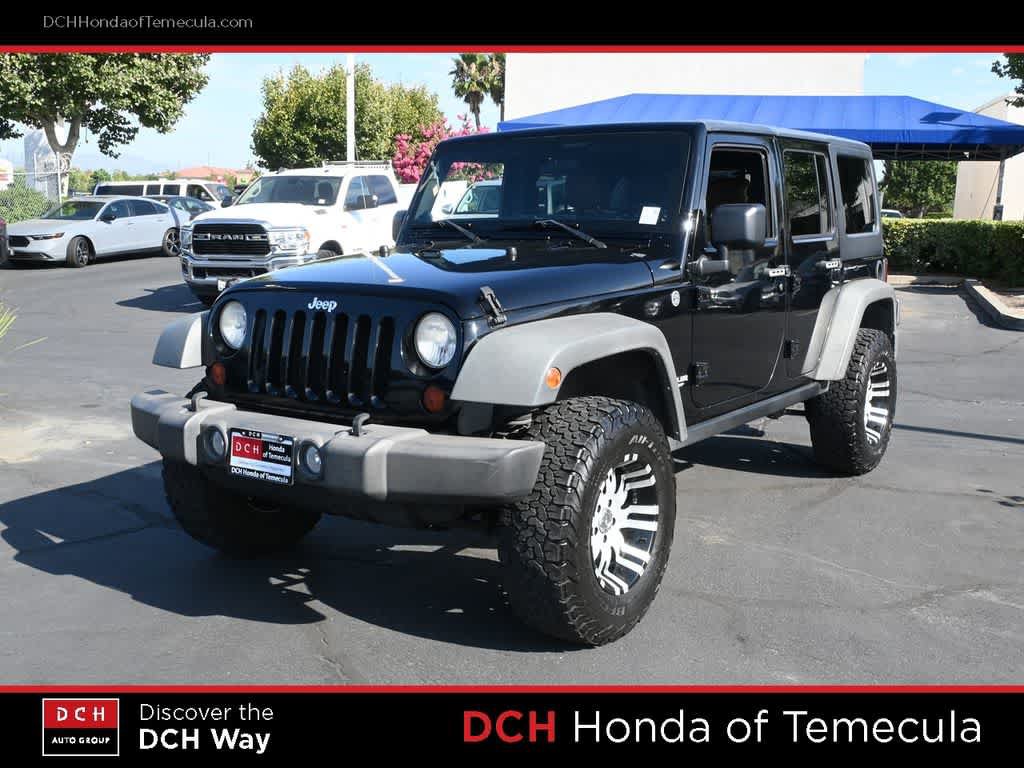 Used 2011 Jeep Wrangler Unlimited Rubicon w/ Trailer Tow Group AWD/4WD video 1