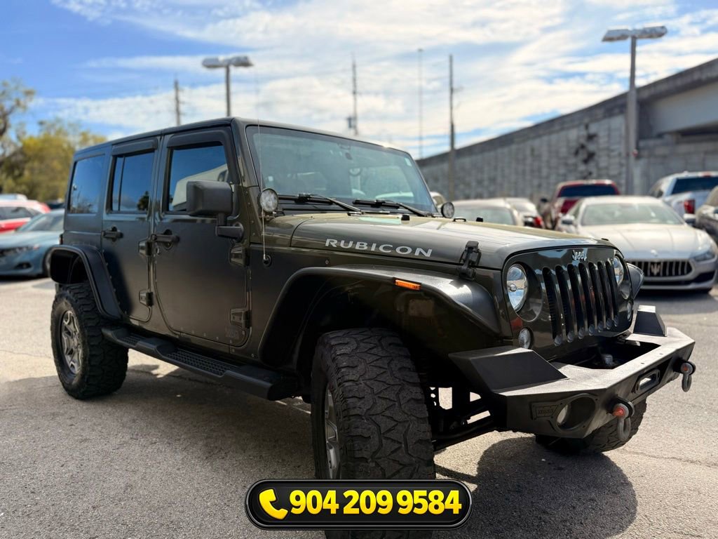 Used 2015 Jeep Wrangler Unlimited Rubicon w/ Dual Top Group AWD/4WD image 9