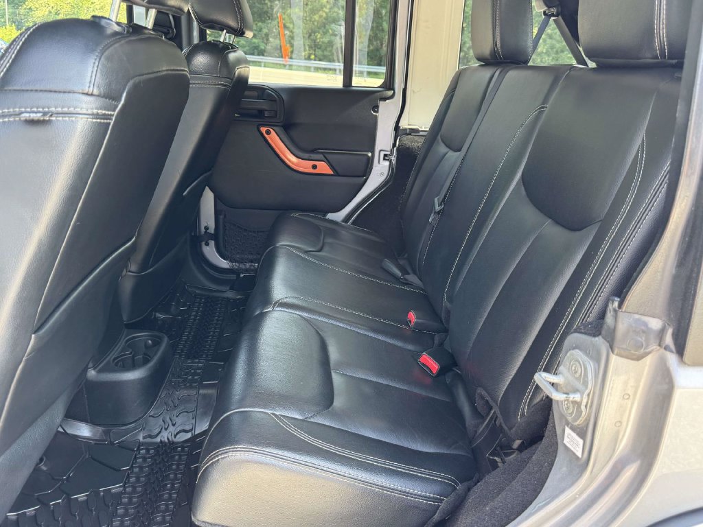 Used 2013 Jeep Wrangler Unlimited Sahara w/ Dual Top Group AWD/4WD image 16