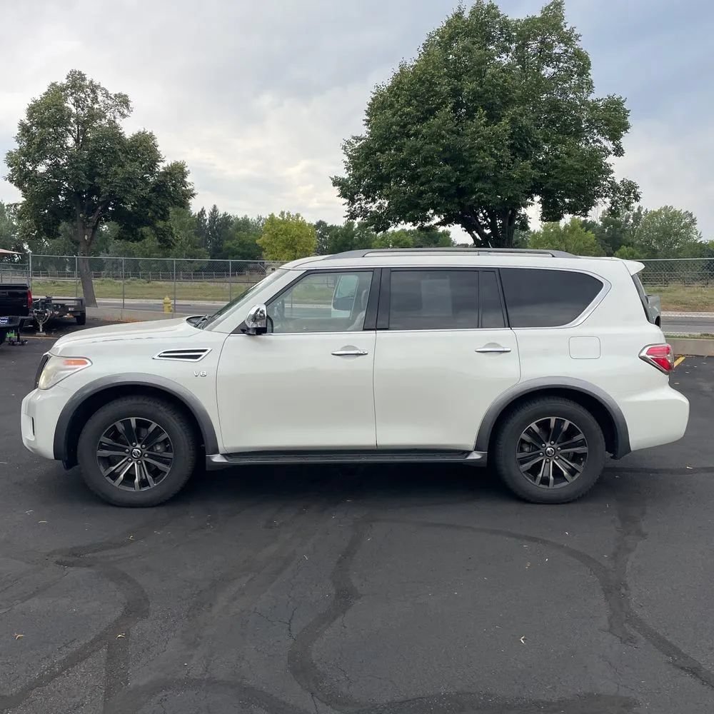 Used 2017 Nissan Armada Platinum w/ Captain Seat Package AWD/4WD image 3