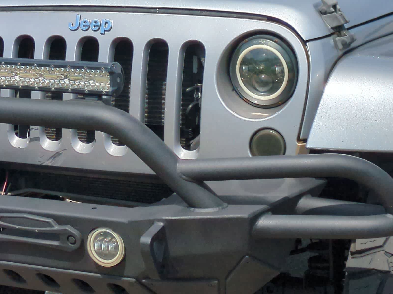 Used 2014 Jeep Wrangler Unlimited Sahara w/ Dual Top Group AWD/4WD image 11