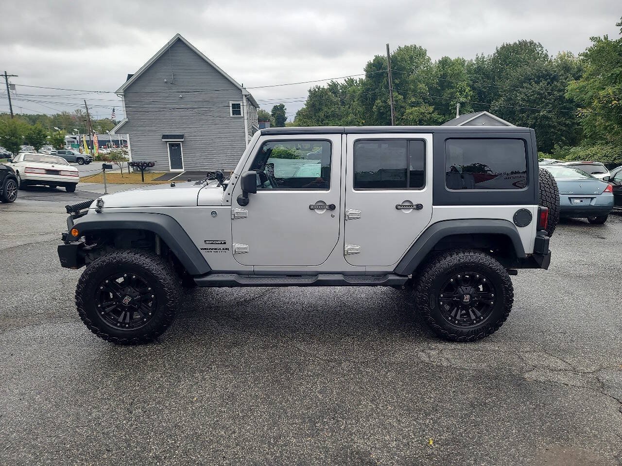 Used 2012 Jeep Wrangler Unlimited Sport w/ Dual Top Group AWD/4WD image 5