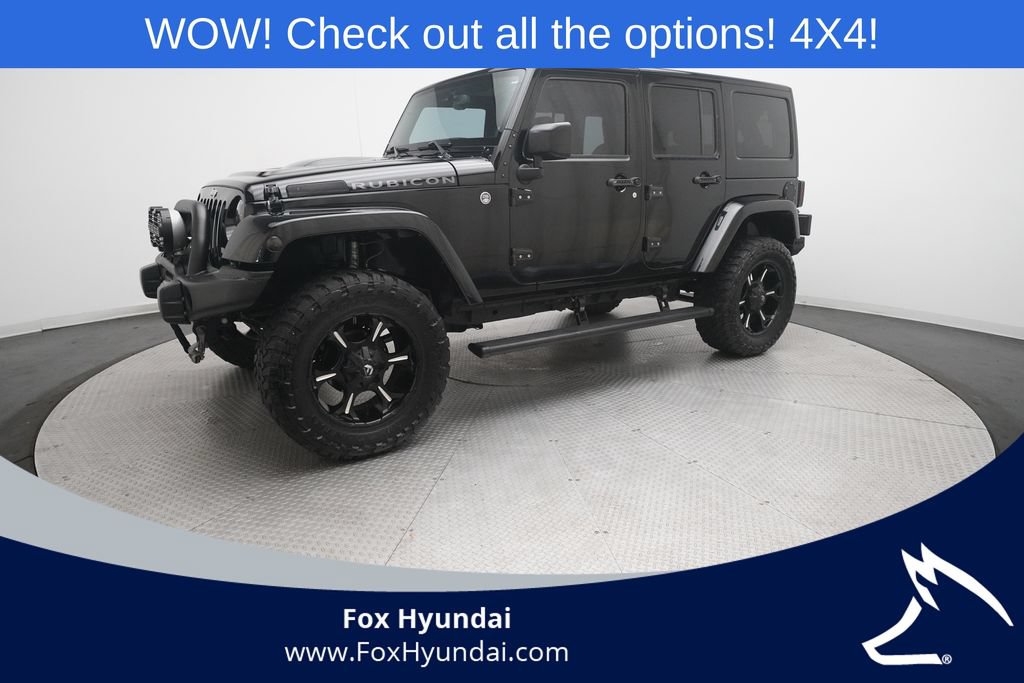 Used 2014 Jeep Wrangler Unlimited Rubicon w/ Dual Top Group