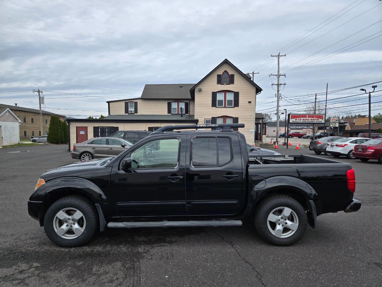 Used 2005 Nissan Frontier LE w/ (J01) Sunroof Pkg image 9