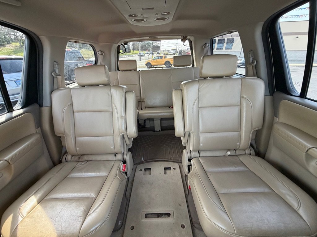 Used 2011 Nissan Armada Platinum w/ 2nd Row Captain Seat Pkg image 12