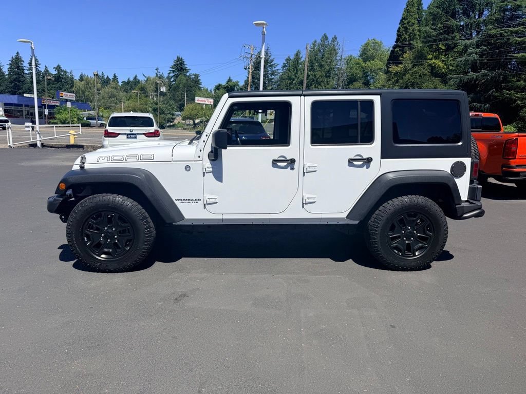 Used 2013 Jeep Wrangler Unlimited Sahara w/ Dual Top Group AWD/4WD image 2