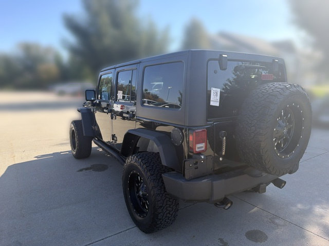 Used 2013 Jeep Wrangler Unlimited Rubicon w/ Dual Top Group AWD/4WD image 11