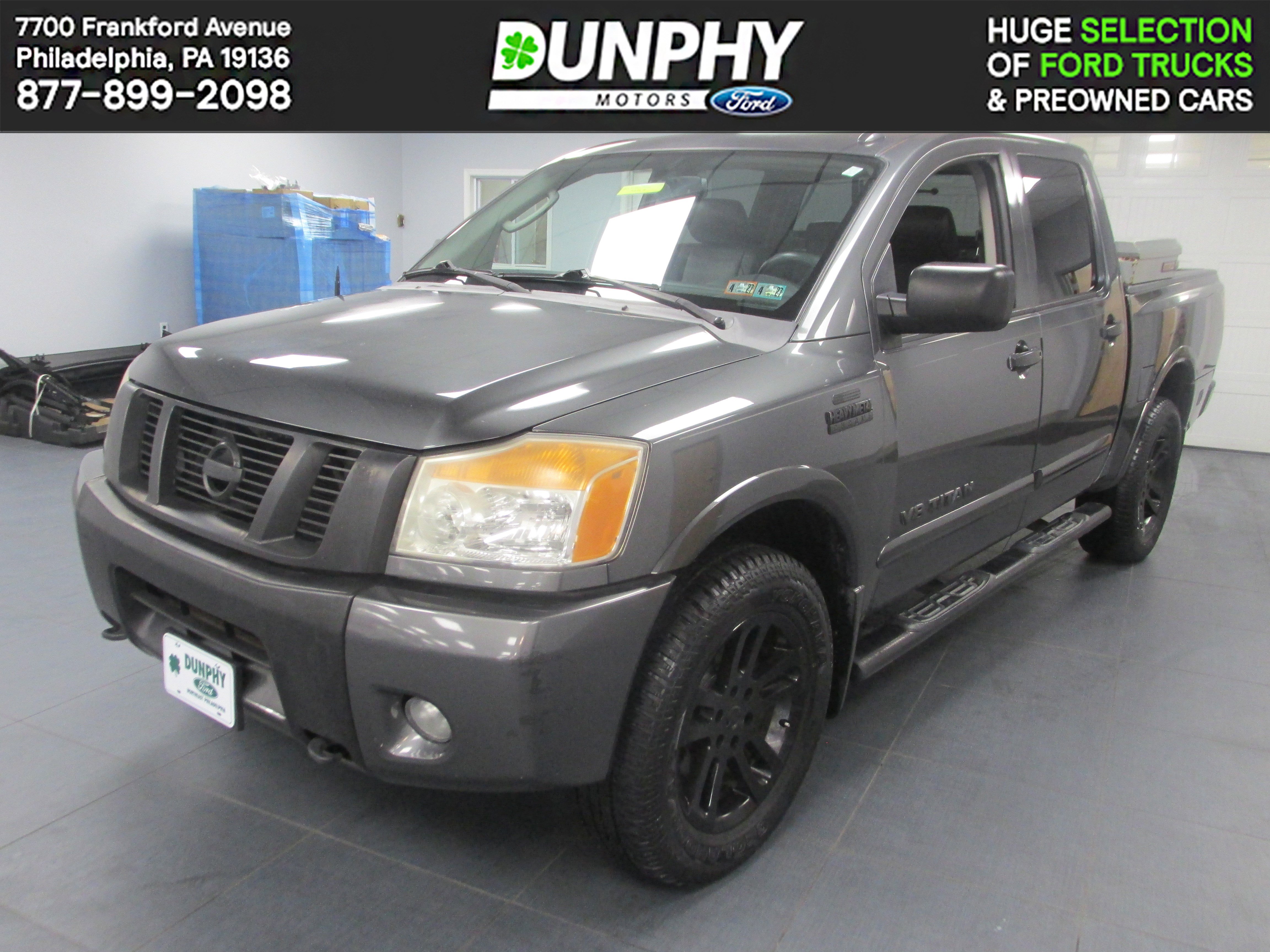 Used 2011 Nissan Titan SL w/ Heavy Metal Edition Pkg AWD/4WD image 1