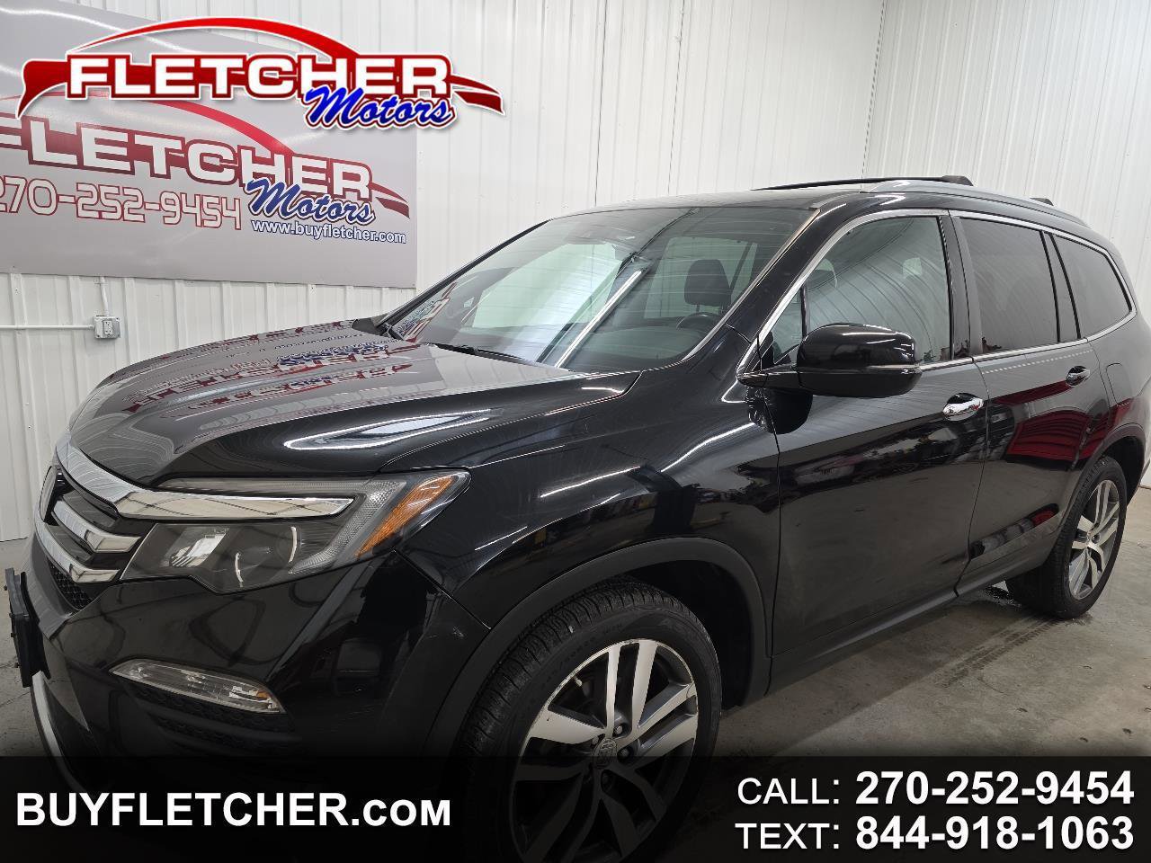 Used 2016 Honda Pilot Touring image 1