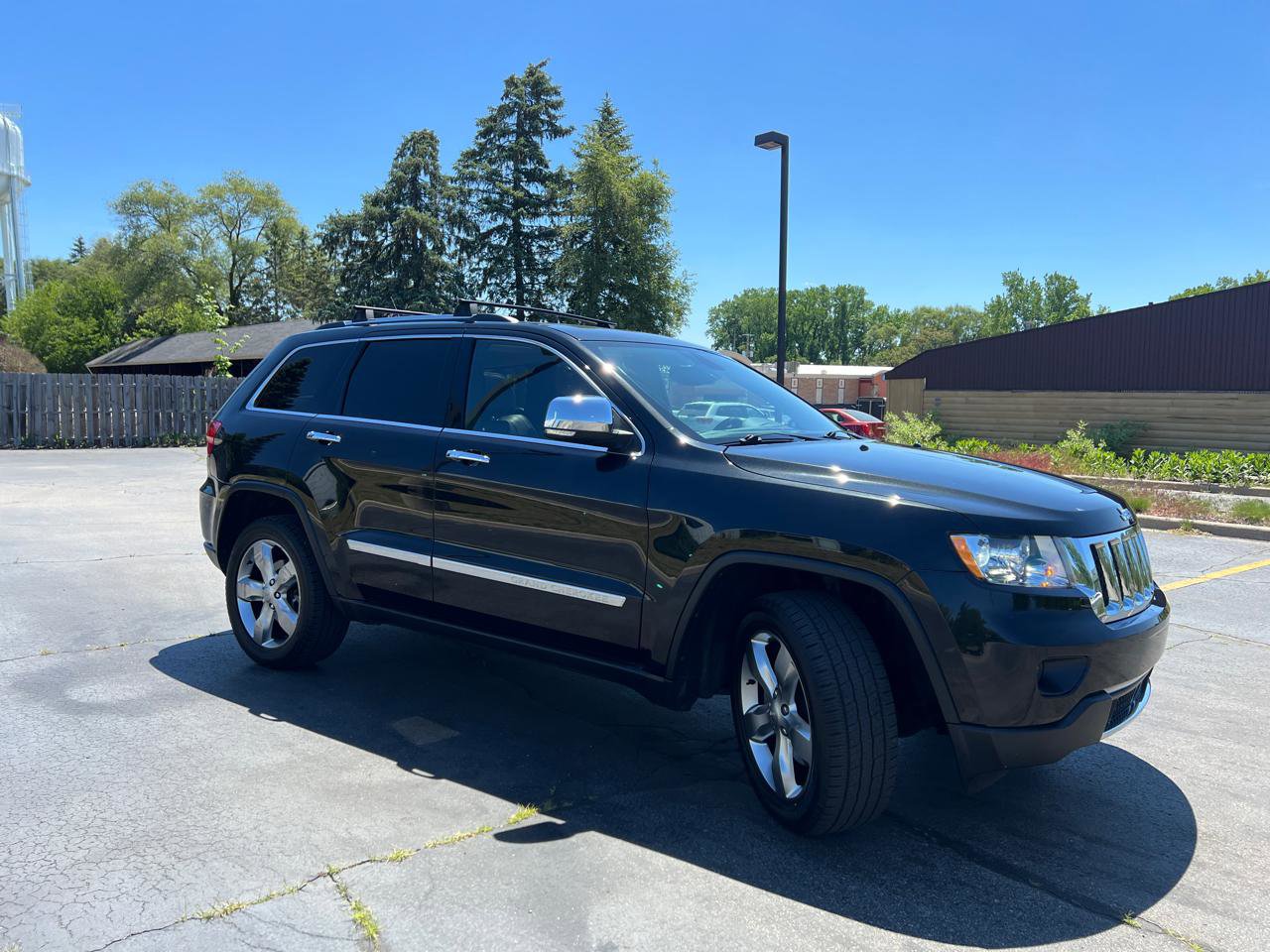 Used 2013 Jeep Grand Cherokee Overland w/ Advance Technology Group AWD/4WD image 11