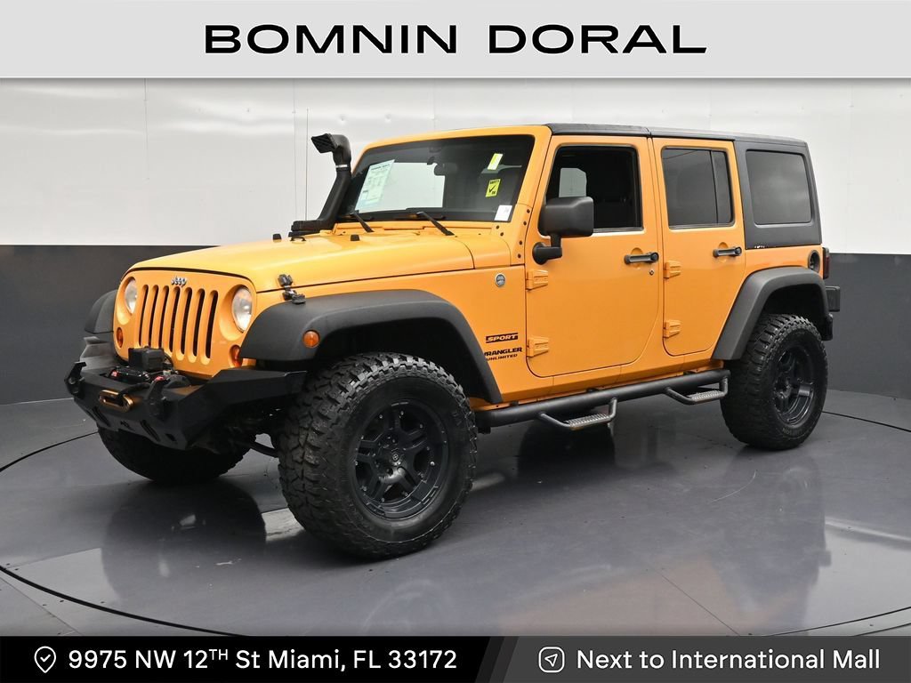 Used 2012 Jeep Wrangler Unlimited Sport AWD/4WD image 1