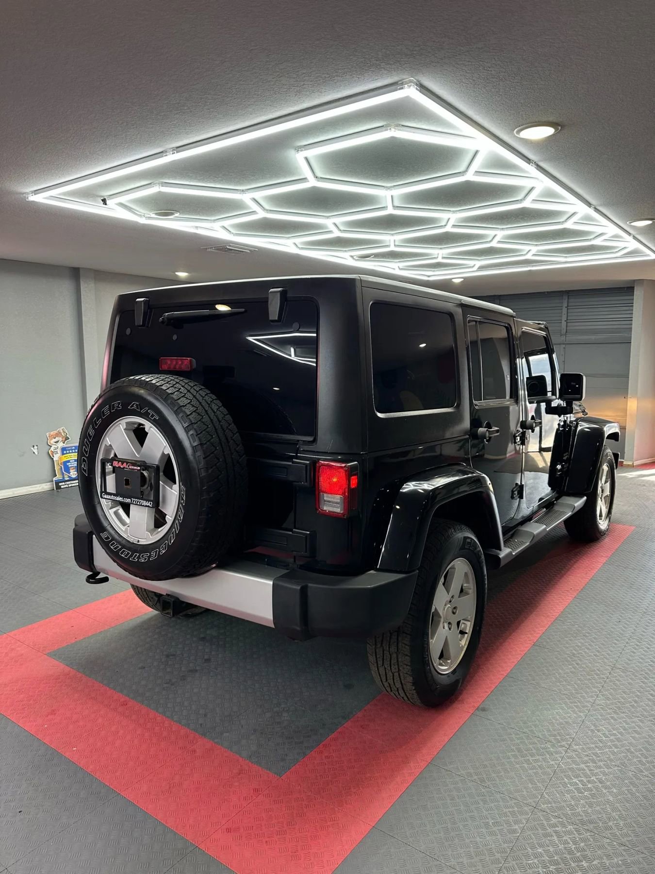 Used 2012 Jeep Wrangler Unlimited Sahara w/ Dual Top Group AWD/4WD image 7