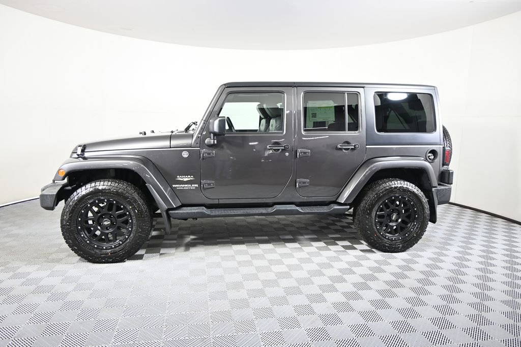 Used 2014 Jeep Wrangler Unlimited Sahara w/ Connectivity Group AWD/4WD image 2