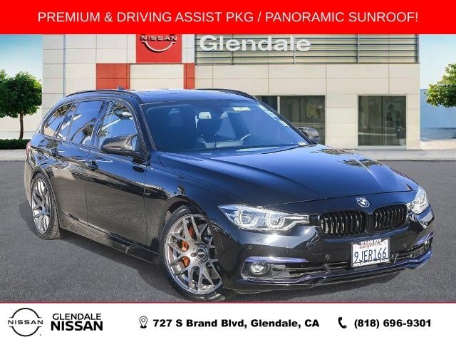 Used 2017 BMW 330i xDrive Wagon AWD/4WD image 1