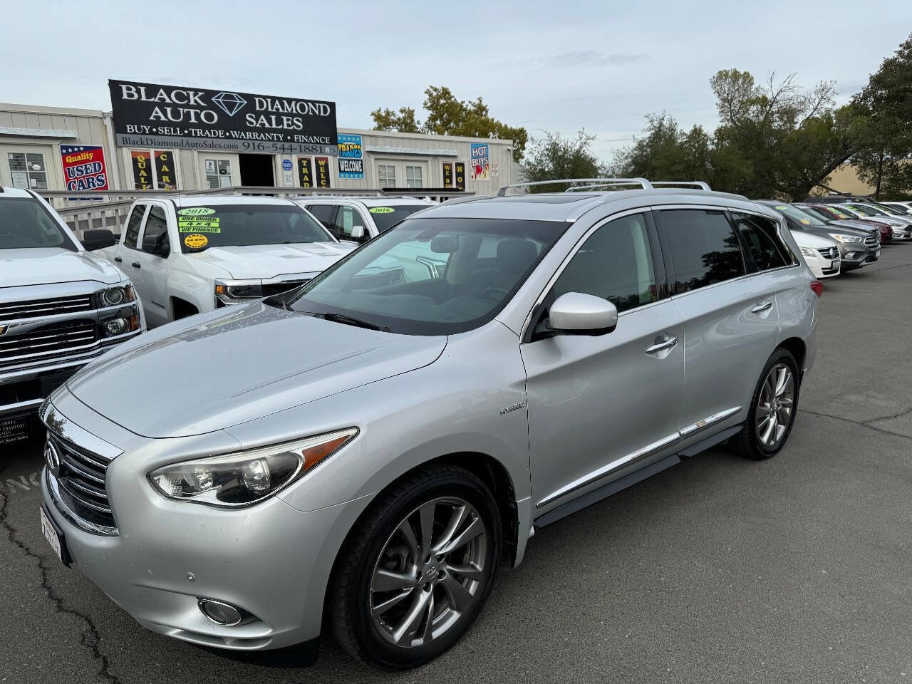 Used 2015 INFINITI QX60 AWD Hybrid w/ HEV Deluxe Touring Package image 1