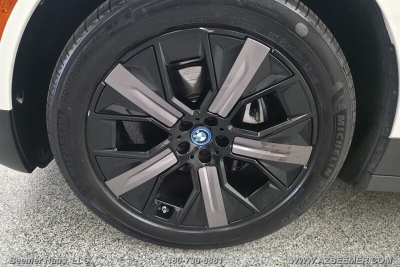 Used 2024 BMW iX xDrive50 w/ BMW I Signature Blue Package AWD/4WD image 19