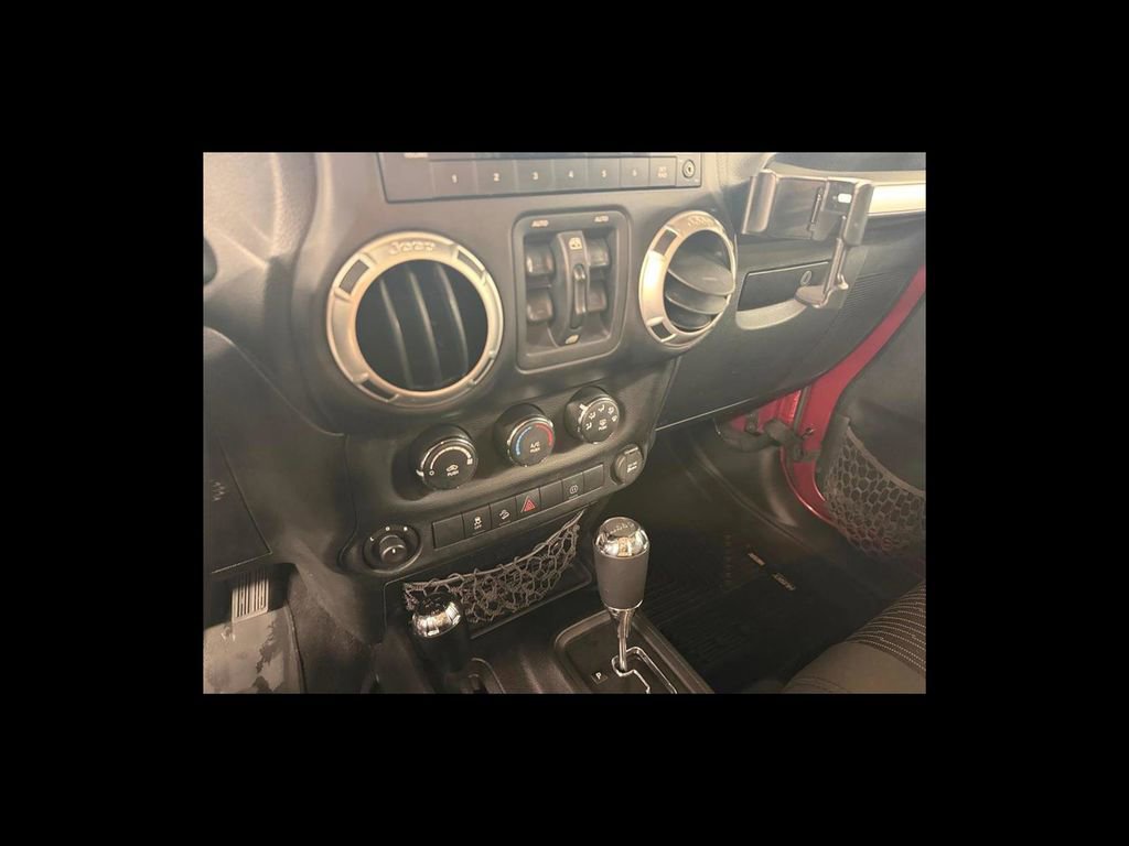 Used 2012 Jeep Wrangler Unlimited Sahara w/ Dual Top Group image 23