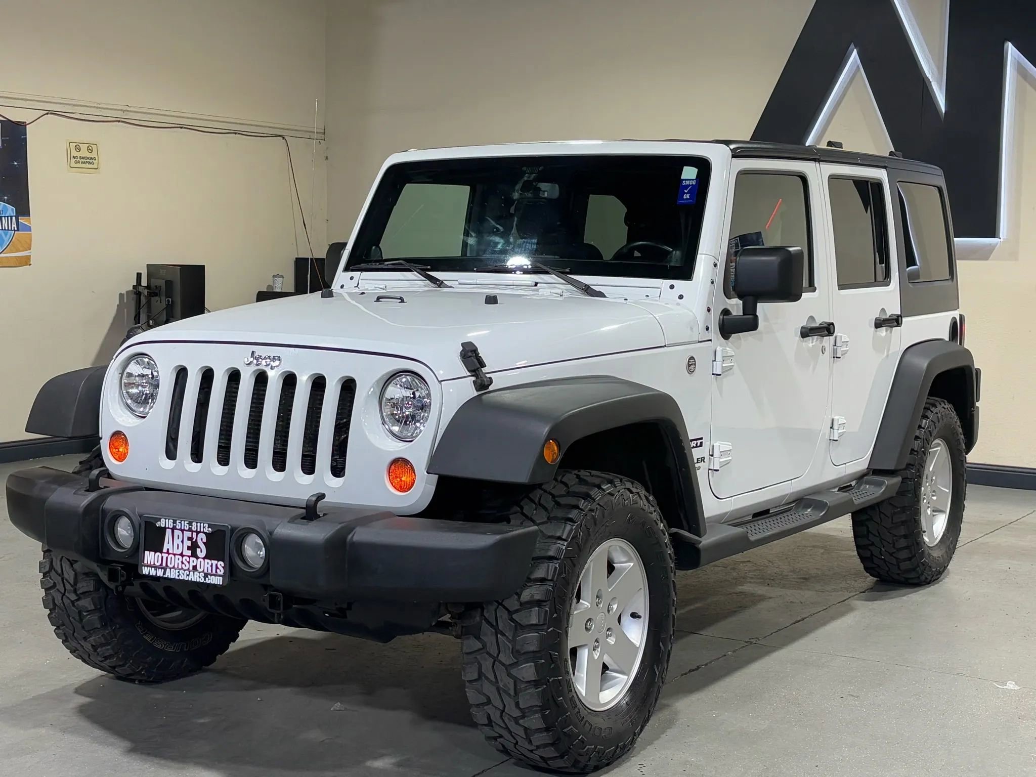 Used 2013 Jeep Wrangler Unlimited Sport AWD/4WD image 1