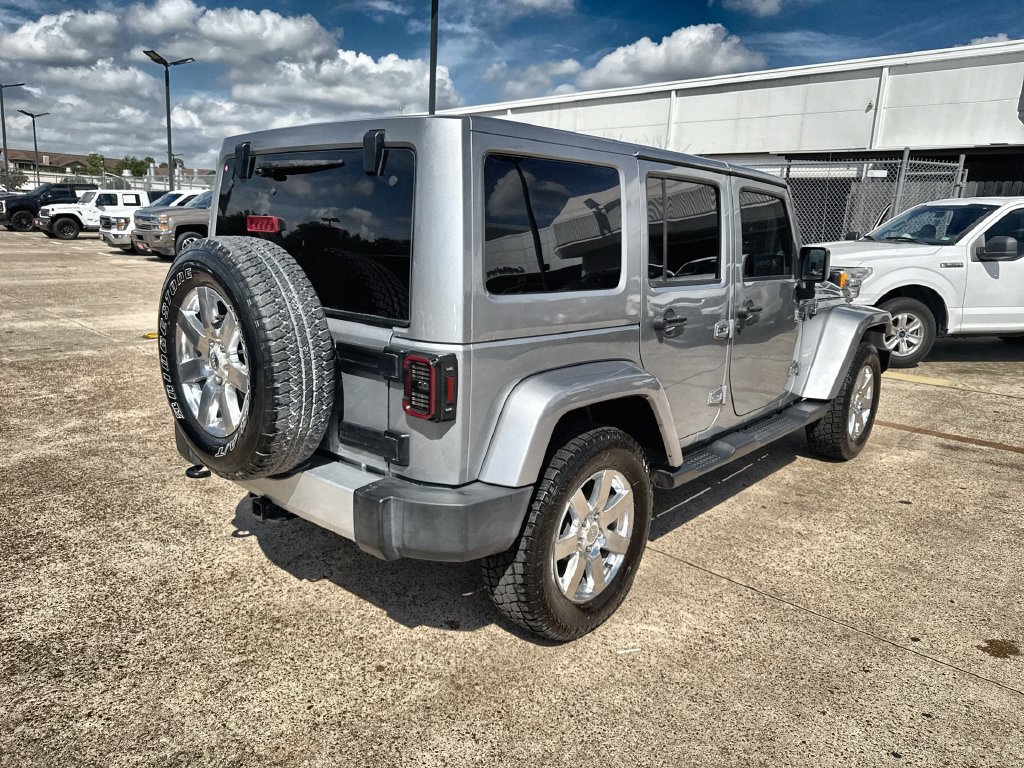 Used 2015 Jeep Wrangler Unlimited Sahara w/ Dual Top Group AWD/4WD image 11