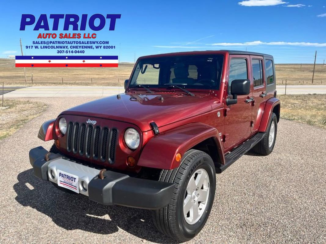 Used 2010 Jeep Wrangler Unlimited Sahara w/ Dual Top Group image 1