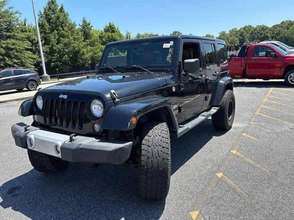 Used 2014 Jeep Wrangler Unlimited Sahara w/ Connectivity Group AWD/4WD image 2