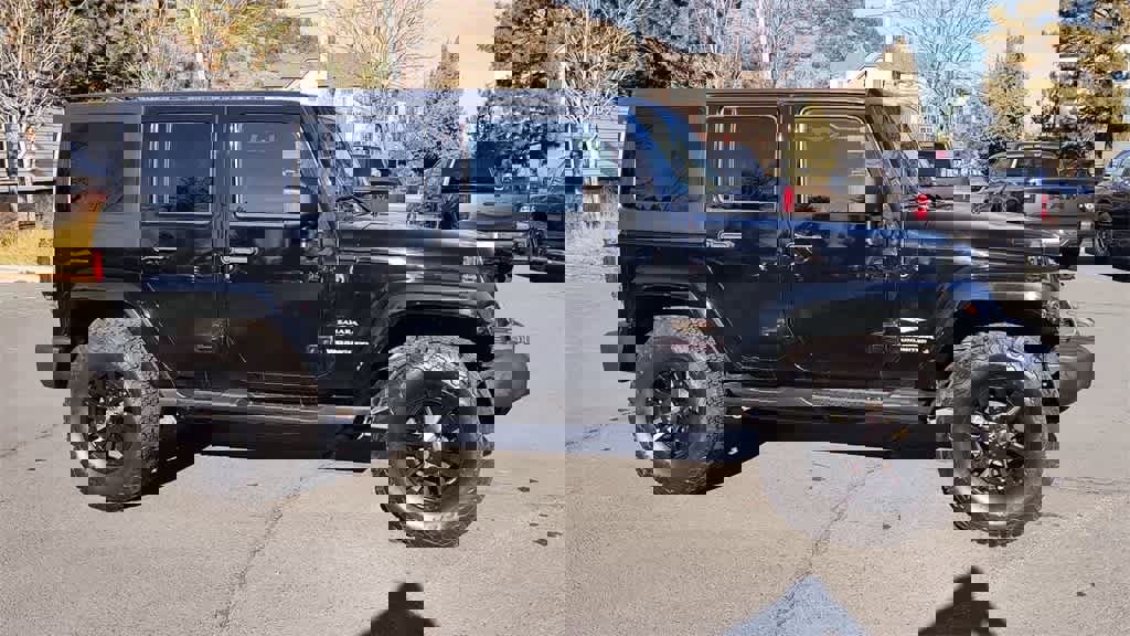 Used 2013 Jeep Wrangler Unlimited Sahara w/ Max Tow Pkg image 2