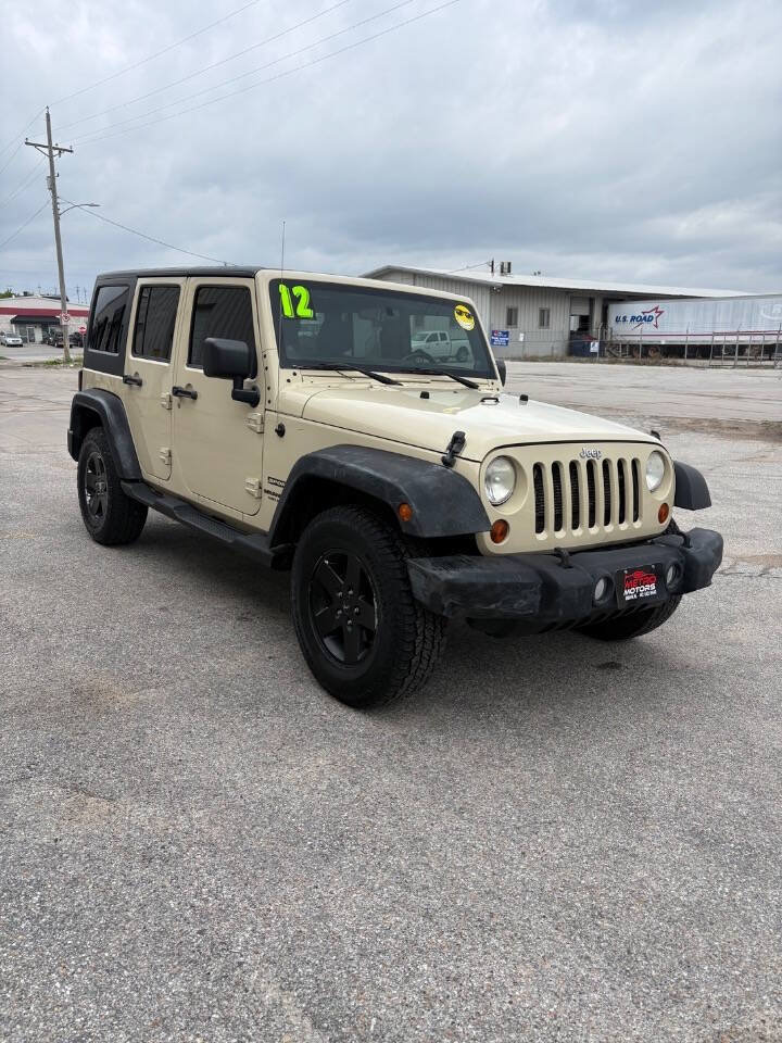 Used 2012 Jeep Wrangler Unlimited Sport AWD/4WD image 2