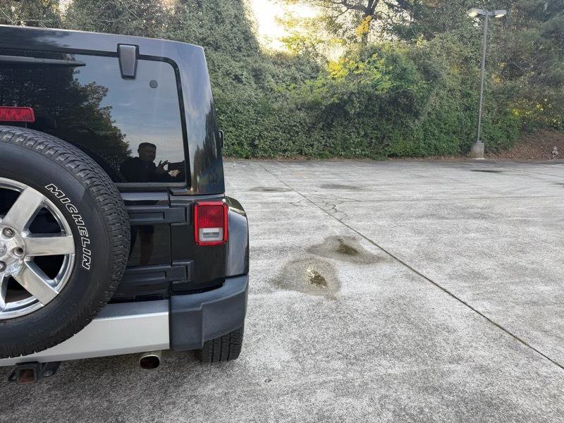 Used 2013 Jeep Wrangler Unlimited Sahara w/ Dual Top Group AWD/4WD image 11