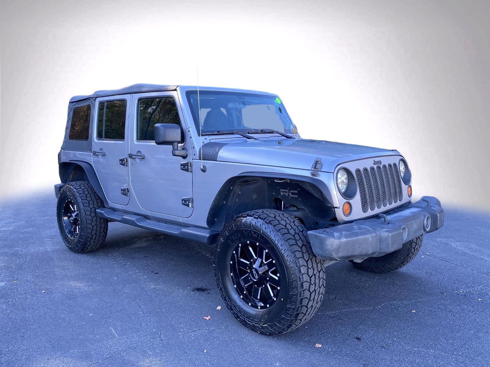 Used 2013 Jeep Wrangler Unlimited Sport image 2