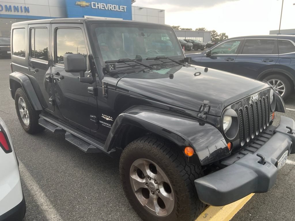 Used 2013 Jeep Wrangler Unlimited Sahara w/ Dual Top Group AWD/4WD image 4