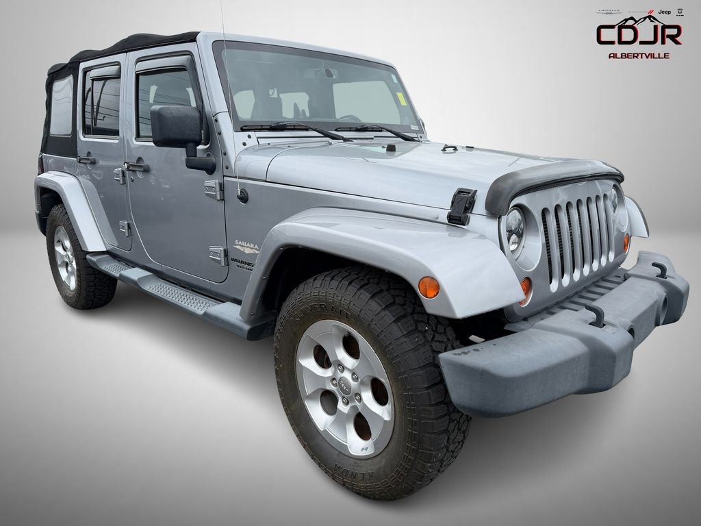 Used 2013 Jeep Wrangler Unlimited Sahara w/ Connectivity Group AWD/4WD image 1
