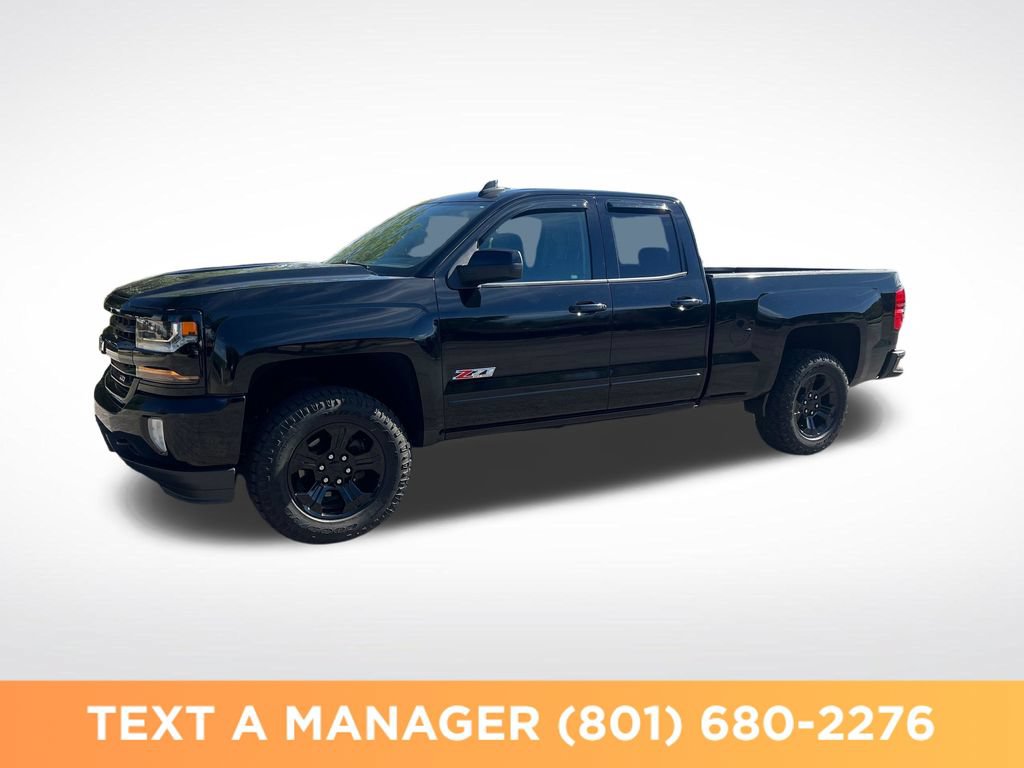 Used 2017 Chevrolet Silverado 1500 LT w/ Midnight Edition AWD/4WD image 1