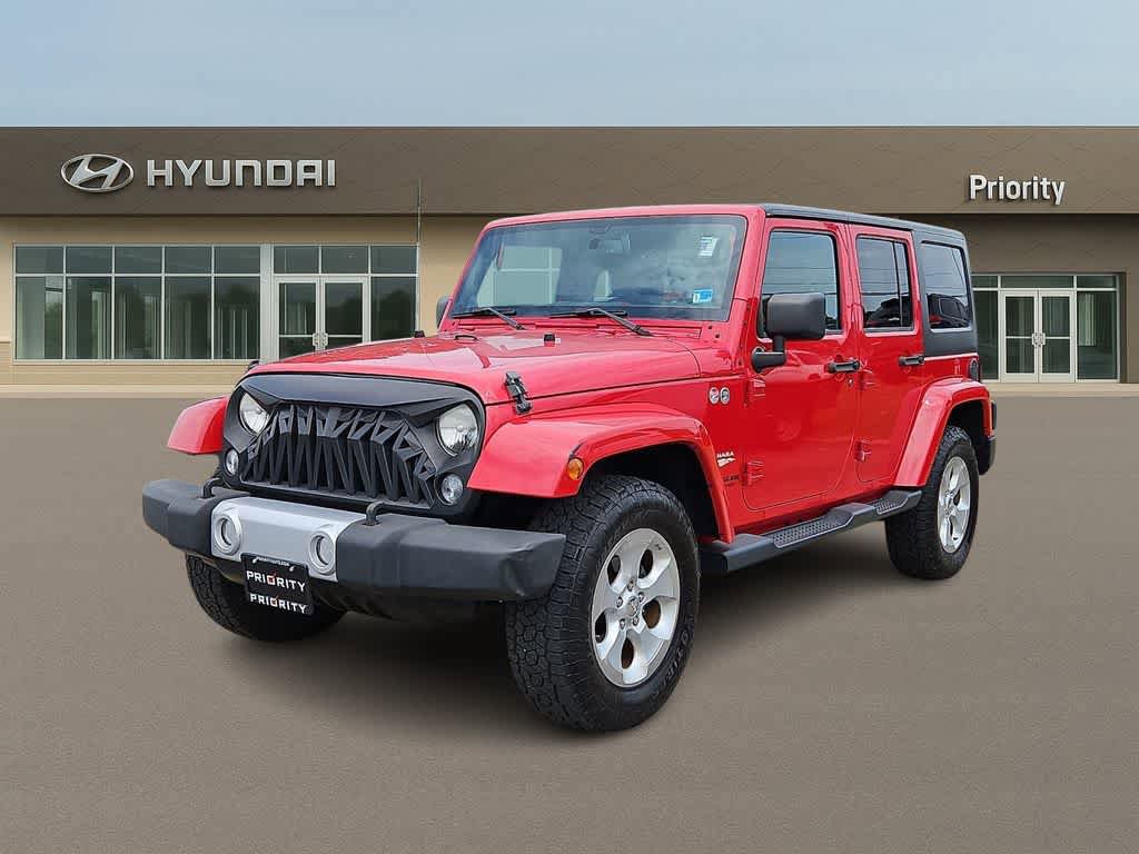 Used 2014 Jeep Wrangler Unlimited Sahara w/ Connectivity Group AWD/4WD image 1