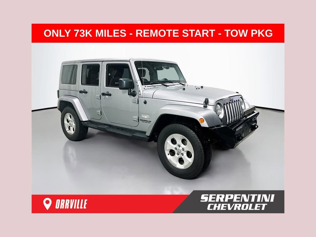 Used 2014 Jeep Wrangler Unlimited Sahara w/ Dual Top Group AWD/4WD image 1